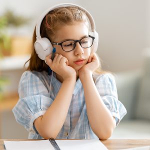 girl-doing-homework-or-online-education-H9N6U2K-1.jpg