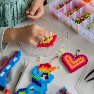 kid-is-playing-with-plastic-thermomosaic-at-home-o-2021-04-05-01-14-46-utc-1.jpg